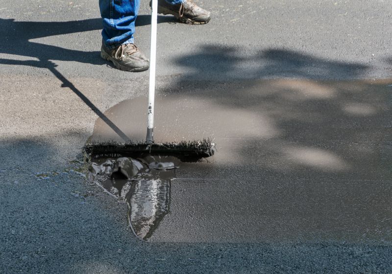 Asphalt Sealcoating Cost Guide — Cost of Asphalt Sealcoating Service